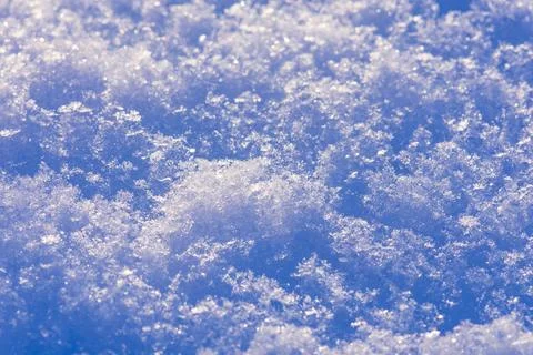 Snow white texture. Background of snow texture. Snowy nature winter backgroun Stock Photos