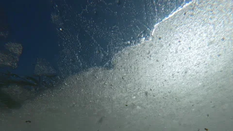Snow-white translucent ice with frozen air bubbles and shimmers in sunshine 스톡 동영상 330134246