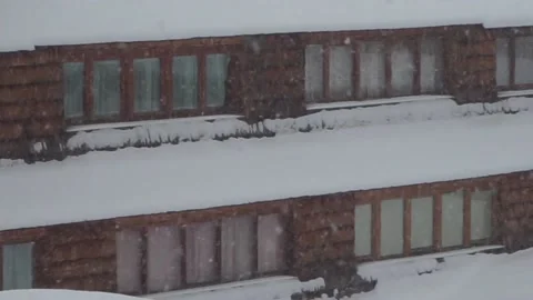 Snow on windows Stock Footage 136892812