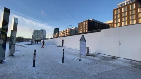 Snow Winter Berlin Wall from Cold War Frozen Spree EastGate Friedrichshain-Kreuz Stock Footage 327665572