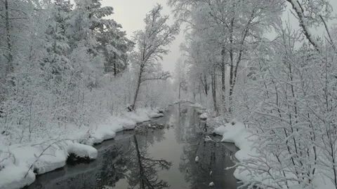 SNOW WINTER DRONE RIVER BED - 3840x2160 - 59,94FPS Stock Footage 168073707