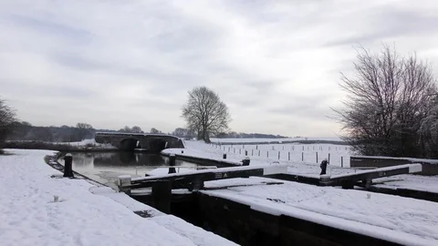 Snow wintry sky canal scene Stock Footage 83389932