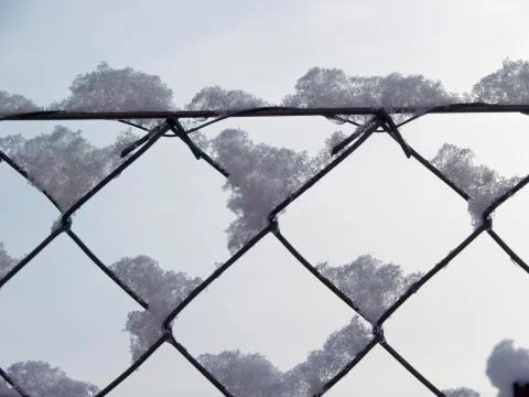 Snow on wire frame Stock Photos