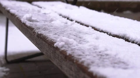 Snow on wooden bench Stock Footage 153035948