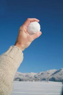 Snowball in hand Stock Photos