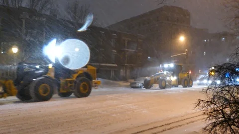 Snowblower causing traffic Stock Footage 105178697
