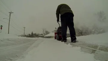 Snowblower on Driveway - Closeup Stock Footage 85640337