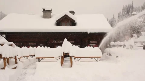 Snowblower use in snowy alps Stock Footage 41822751