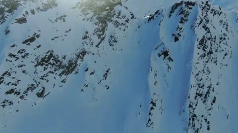 Snowboard bigmountain from drone Stock Footage 246699913