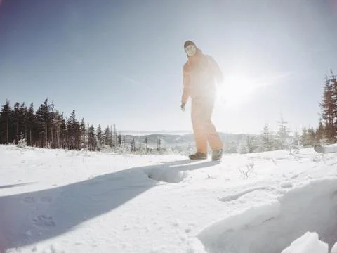 Snowboard in top of mountain Stock Photos