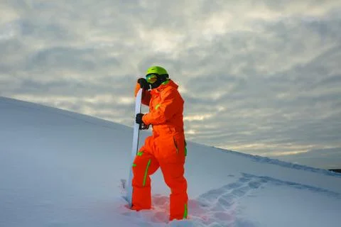 Snowboarder at the background of sunset Stock Photos