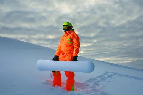 Snowboarder at the background of sunset Stock Photos