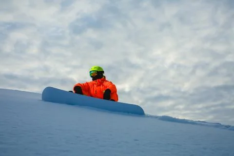 Snowboarder at the background of sunset Stock Photos