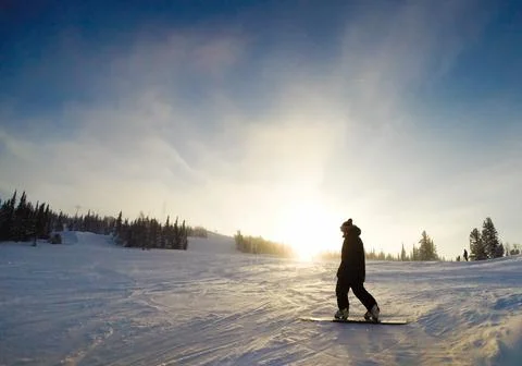 Snowboarder on the background of the sunset Foto stock