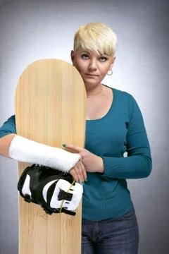 Snowboarder with  broken arm Stock Photos