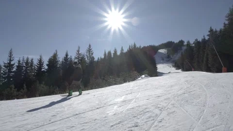 Snowboarder carving downhill Stock Footage 222362336