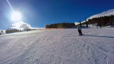 Snowboarder comes to a stop Stock Footage 48347727