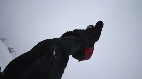 Snowboarder coming down on a snowboard Time Laps Stock Footage 1060442