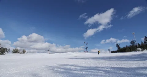 A snowboarder covers the camera with snow Stock Footage 150363386