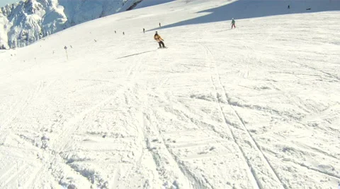 Snowboarder crash while filming Stock Footage 3074701