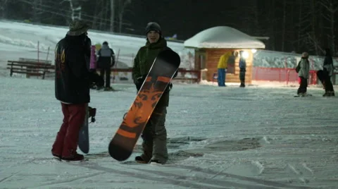 Snowboarder dancing at the resort Stock-Footage 59556479