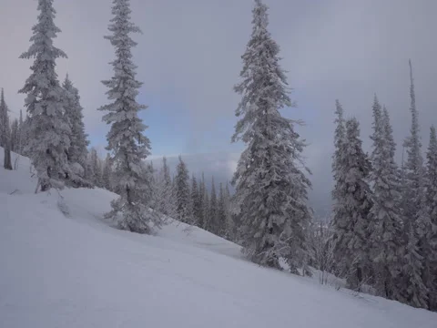 Snowboarder descends a slope Stock Footage 70926016