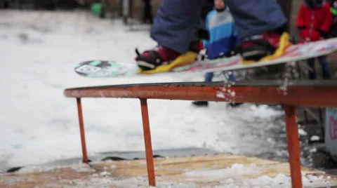 Snowboarder does the trick close-up Stock Footage 59852069