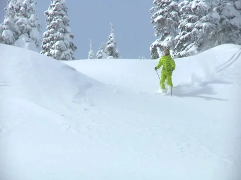 Snowboarder down powder Stock Footage 740049