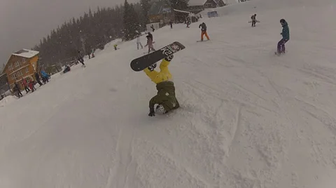 Snowboarder fall down and stand up,trick Stock Footage 36022166