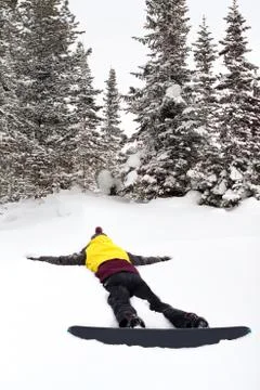 Snowboarder fallen down Stock Photos