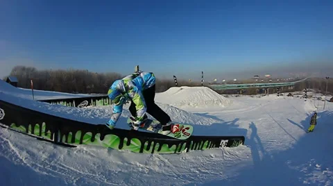 Snowboarder falls from the rail Video stock 35498929