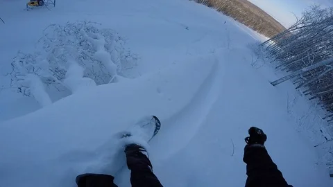 Snowboarder in the forest. POV view. Stock Footage 97837372