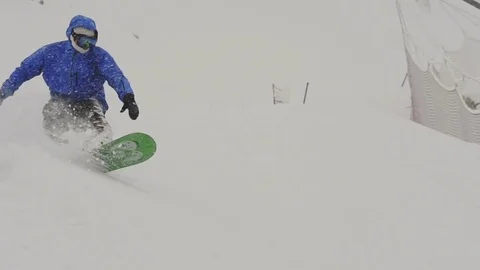Snowboarder Freerider rides in the forest Stock Footage 77756975