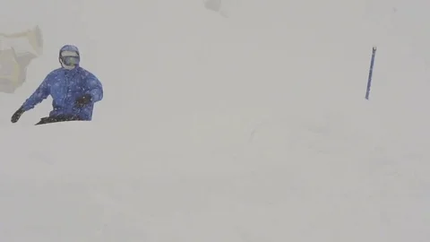 Snowboarder Freerider rides in the forest Stock Footage 77757060