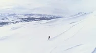 Snowboarder Girl Winter Mountains Snowboard Aerial 4K Stock Footage