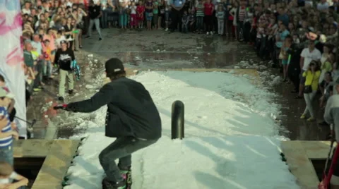 Snowboarder glides through the pipe Stock Footage 61344169