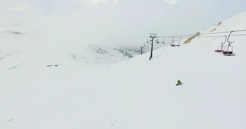 Snowboarder is going down Stock Footage 119070167