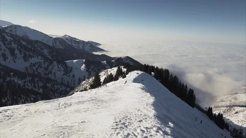 Snowboarder is going down in the mountains Stock Footage 72196795