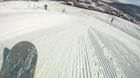 Snowboarder going down snowy mountain. pov B Stock Footage 106841753