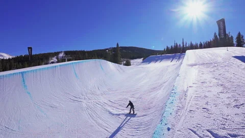 Snowboarder half pipe method air jump Woodward Copper Mountain ski 스톡 동영상 246023261