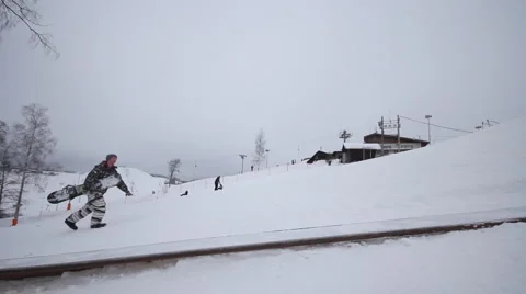 Snowboarder jumping Stock Footage 1060414