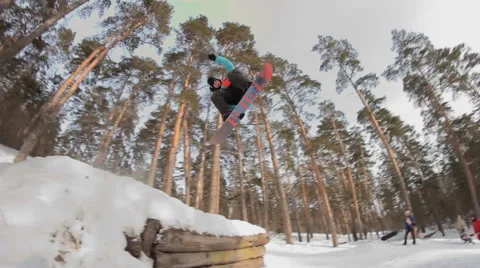 Snowboarder jumping Stock Footage 52934356