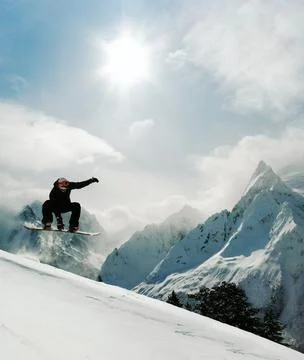 Snowboarder jumping 스톡 사진