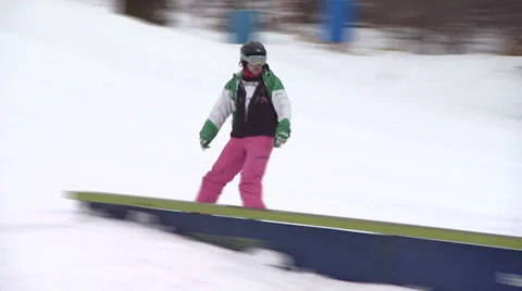 Snowboarder Jumping off Ramp Stock Footage 26068941