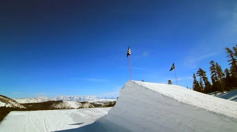 SNOWBOARDER JUMPS Video stock 1012504