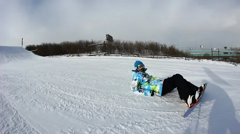 Snowboarder jumps trick Stock Footage 35455995