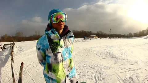 Snowboarder jumps trick Stock Footage 35455997