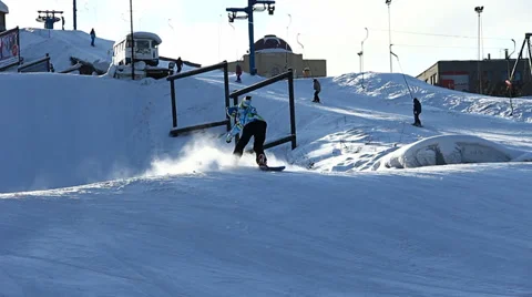 Snowboarder jumps trick Stock Footage 35455998