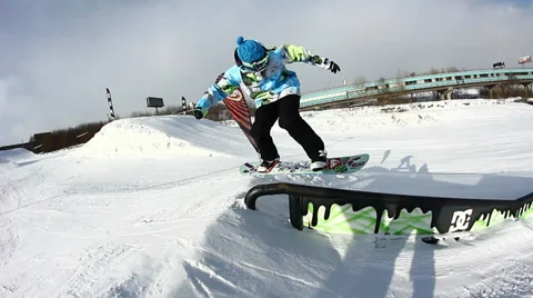 Snowboarder jumps trick Stock Footage 35456067