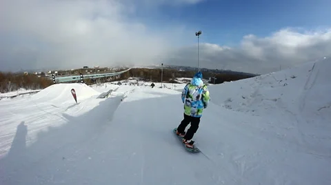Snowboarder jumps trick Stock Footage 35456142
